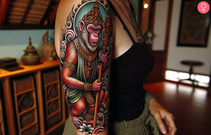 A woman sporting a Chinese Monkey King tattoo on her upper arm