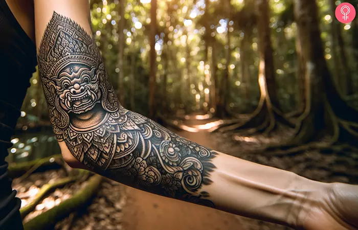 A woman with a Cambodian Monkey King tattoo on her arm