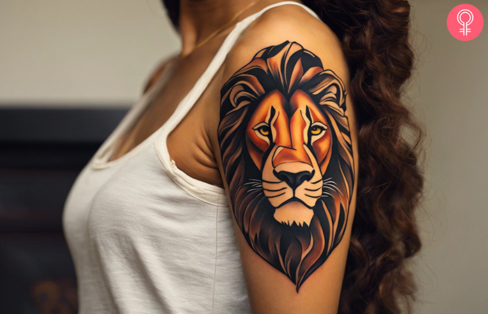 A woman with a Lion King Mufasa tattoo on her upper arm