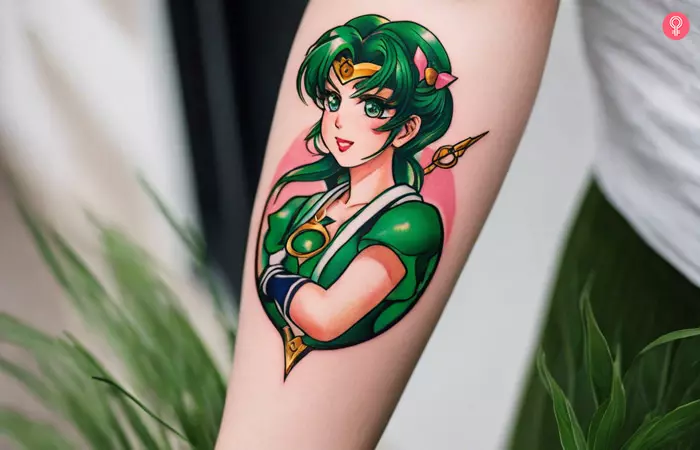 A woman with a Sailor Jupiter tattoo on her forearm