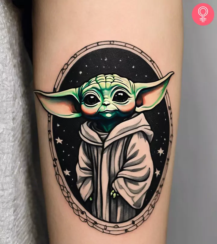 A woman with a baby Yoda tattoo