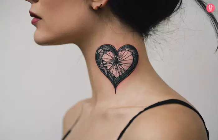 A woman with a broken heart tattoo on her neck