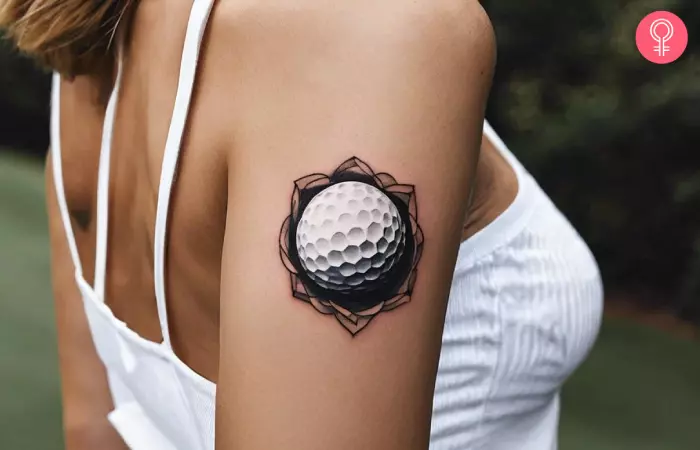 A woman with a golf ball tattoo on her arm