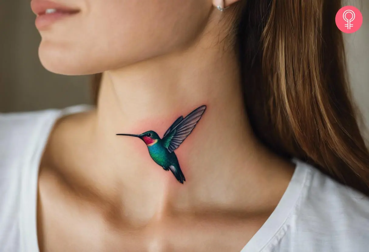 A woman with a hummingbird tattoo on her neck