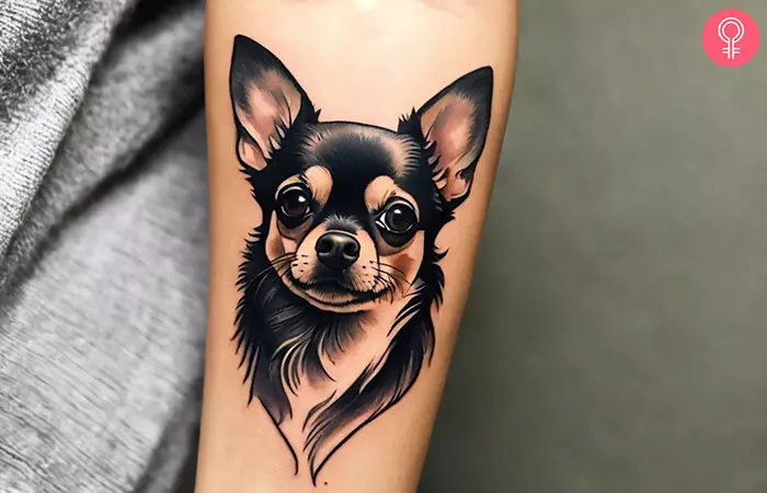 A woman with a long-haired Chihuahua tattoo