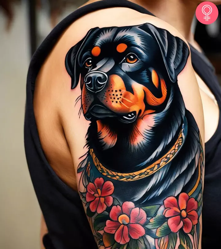 A woman with a rottweiler tattoo on her upper arm