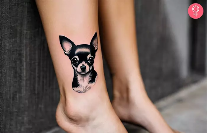 A woman with a small Chihuahua tattoo on her ankle