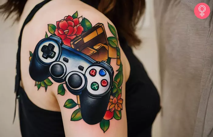 A woman with a traditional video game console tattoo on her shoulder