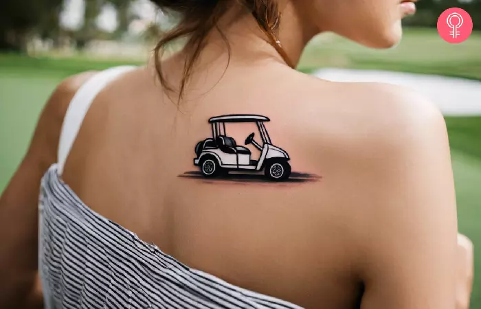 A woman with golf cart tattoo on her upper back
