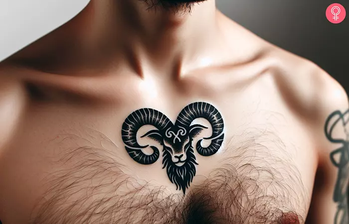 An Aries tattoo on the chest of a man