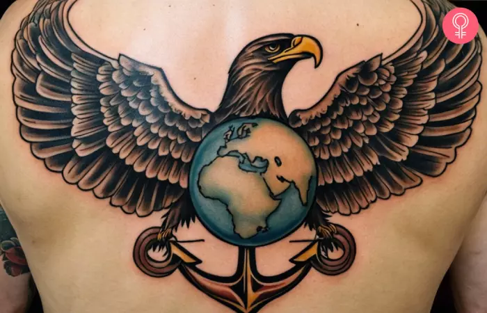 An eagle, globe, and anchor tattoo on the back of a man
