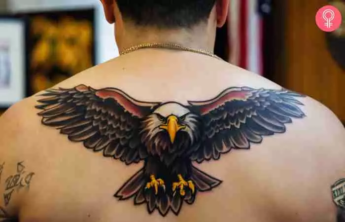 An eagle military tattoo on a man’s upper back