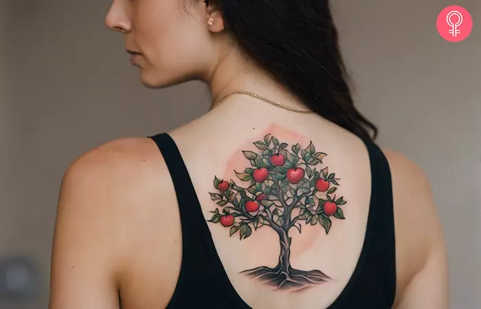 Apple tree tattoo on the back