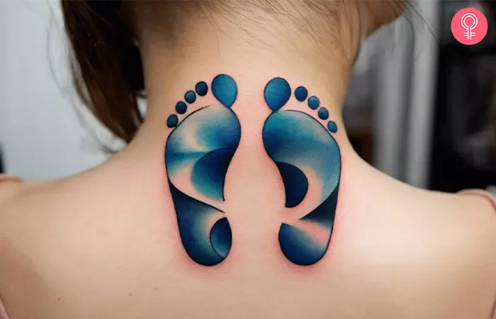 A baby footprint tattoo on a woman’s neck