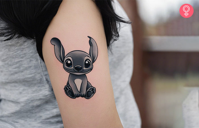 Black and white tattoo of Stitch