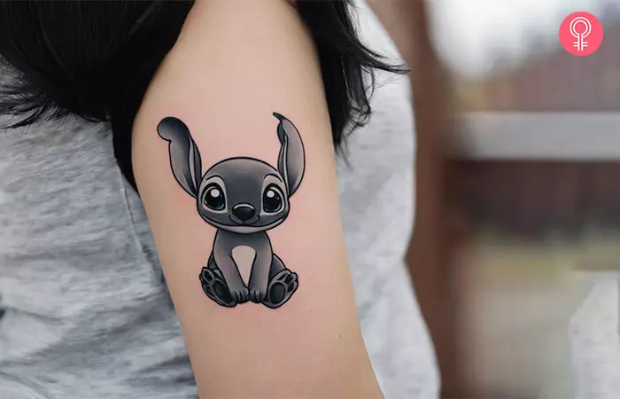 Black and white tattoo of Stitch