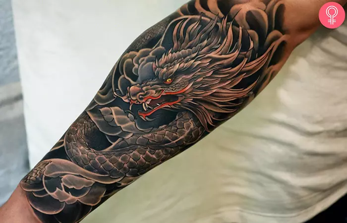 Black and grey Japanese dragon tattoo with red highlights