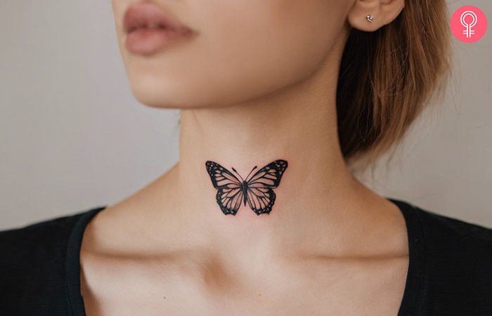 Butterfly tattoo on the throat