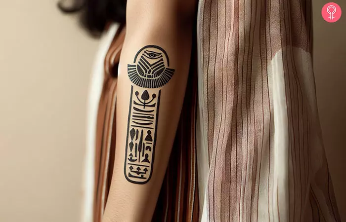 A cartouche hieroglyphics tattoo on the forearm