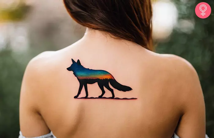Coyote tattoo on a woman’s back