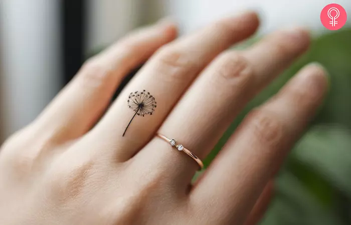 Dandelion finger tattoo