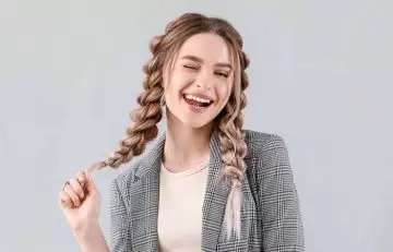 Woman with braided pigtails 
