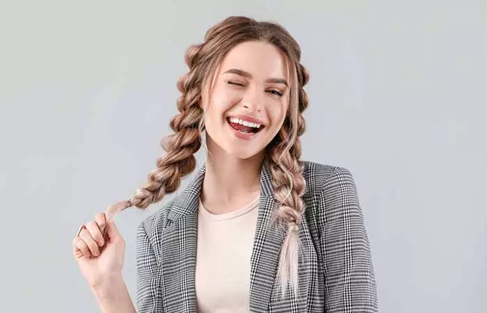 Woman with braided pigtails 