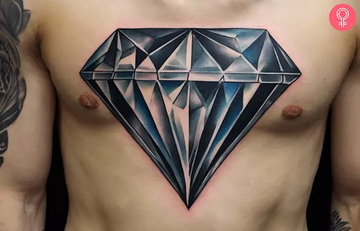 A man with a diamond tattoo on his chest