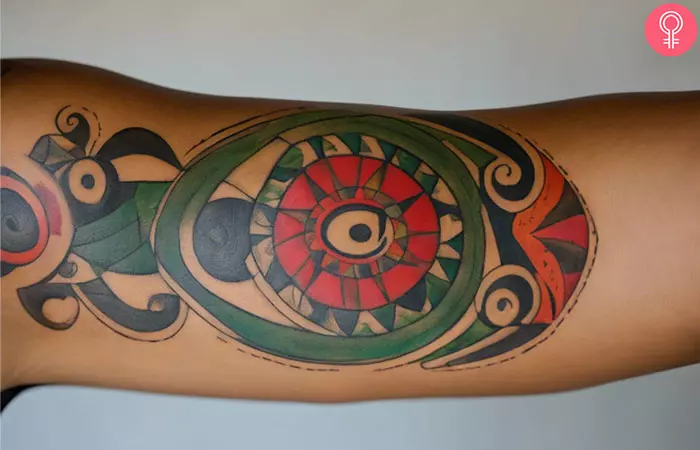 A woman with a Dominican Taino tattoo on her arm