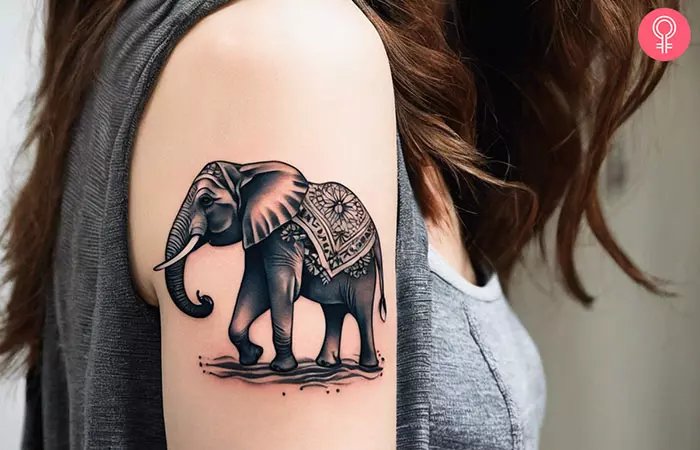 Elephant tattoo on a woman’s upper arm