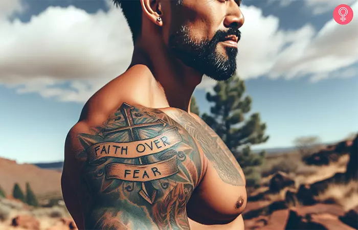 A man sporting a faith over fear shoulder tattoo