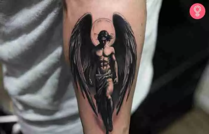 Fallen angel tattoo on forearm