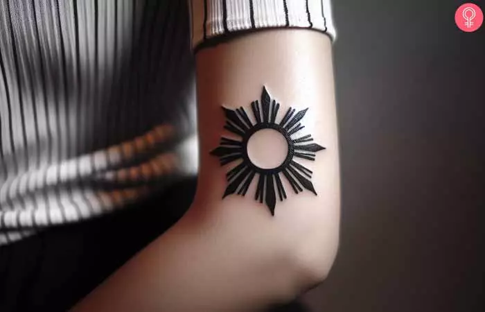 Filipino Sun Elbow Tattoo