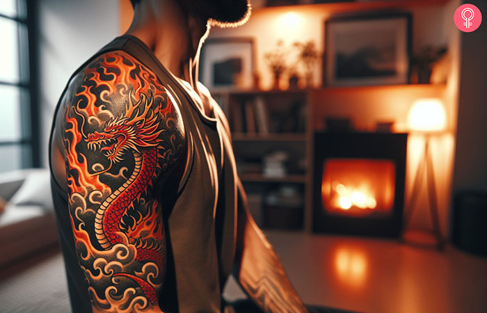 A fire-breathing dragon tattoo design on the arm of a man