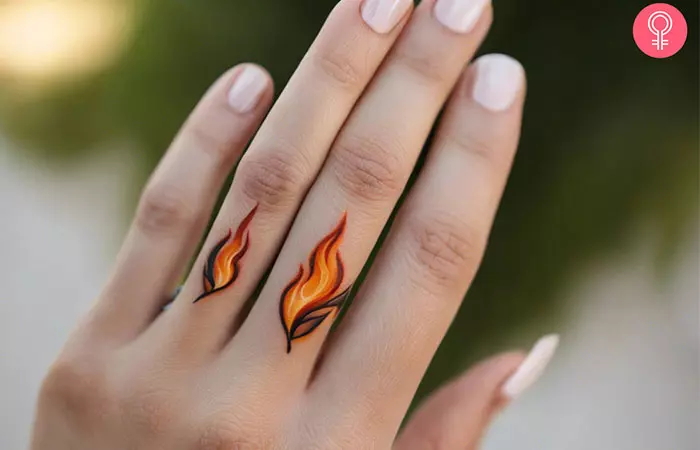 Woman with flame finger tattoo