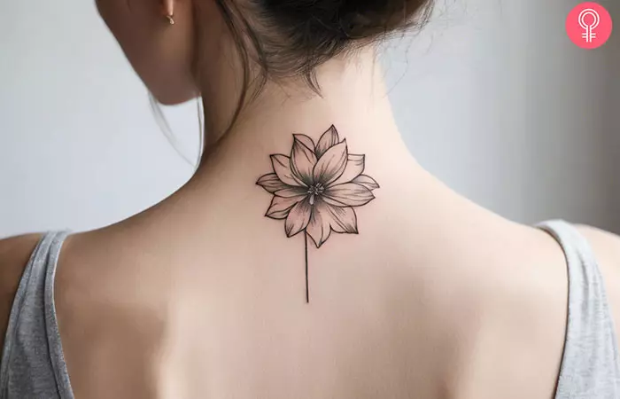 Flower tattoo on the back of the neck