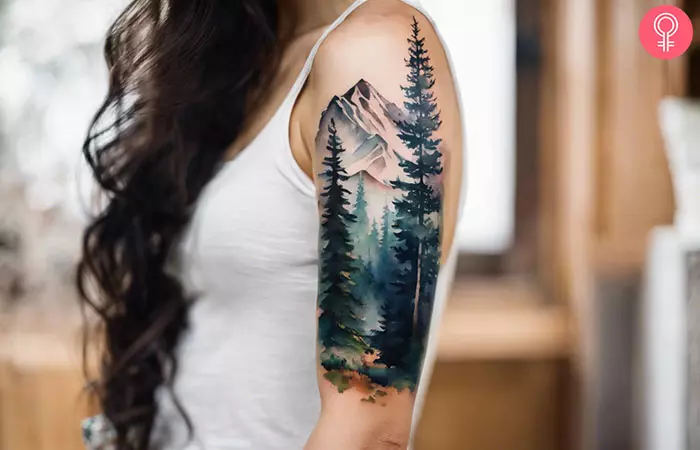 Forest and mountain sleeve tattoo