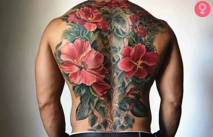 A man with a full back tattoo