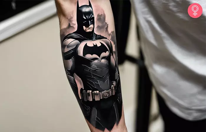 A full length Batman tattoo on the inner arm