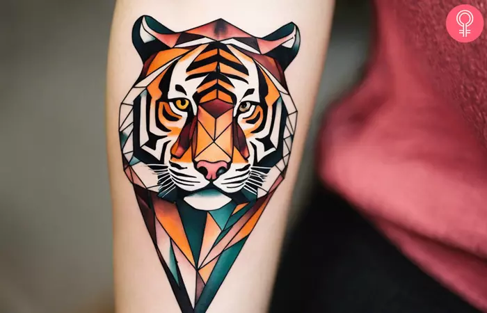A geometric tiger tattoo on the arm
