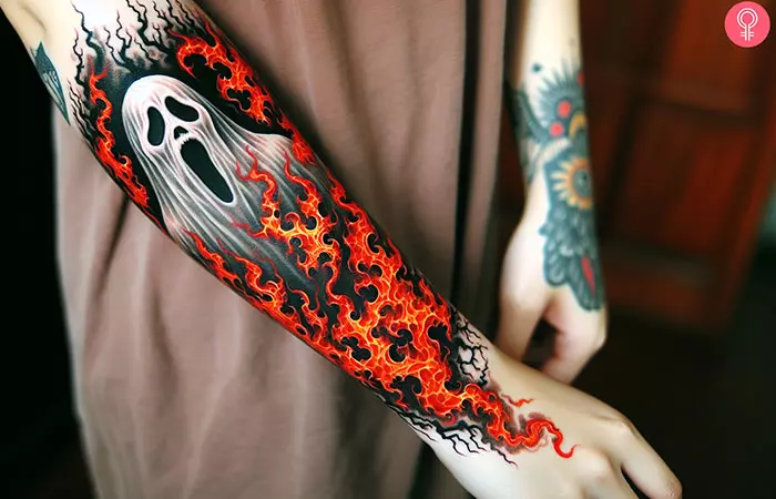 Woman with ghost flame tattoo on her lower arm