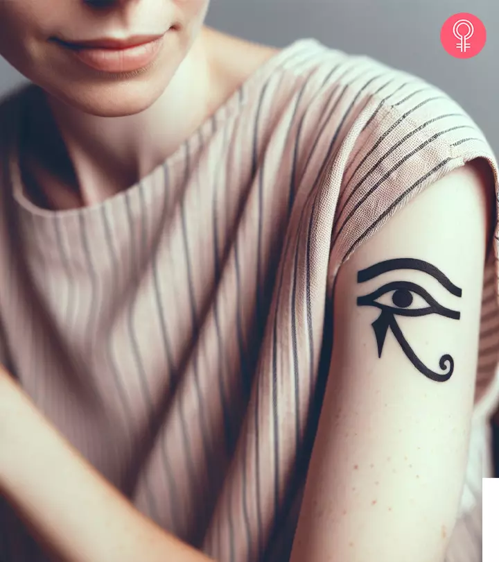A woman with an eye-of-Horus tattoo