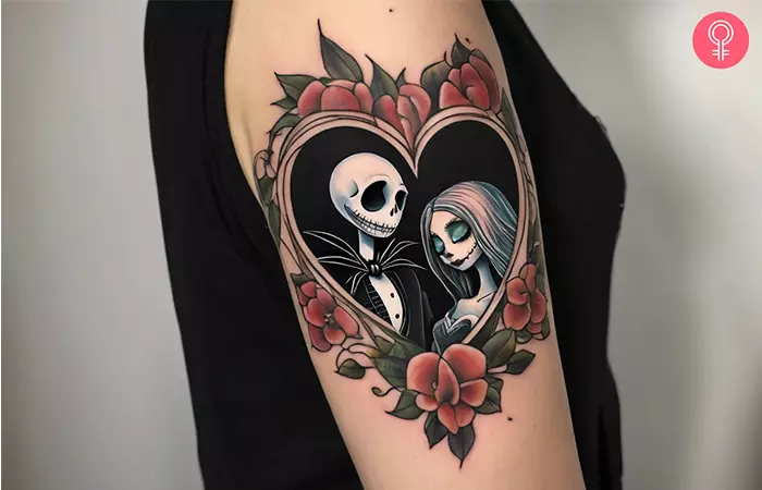 A Jack and Sally-inspired one heart tattoo on the upper arm