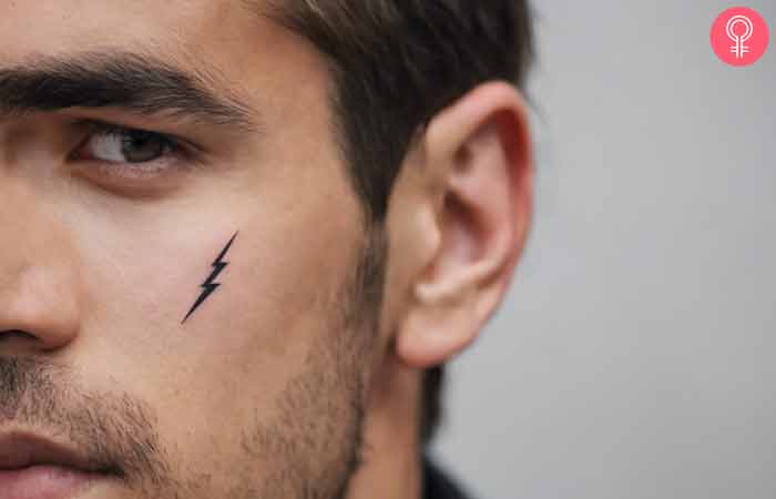 Lightning bolt under eye tattoo