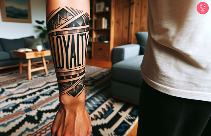 A loyalty gangster tattoo design on the forearm of a man