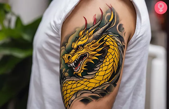 Man with a Japanese dragon tattoo on the arm