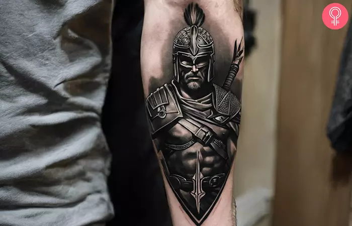 Man with a black warrior on his forearm