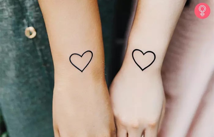 Matching heart tattoos