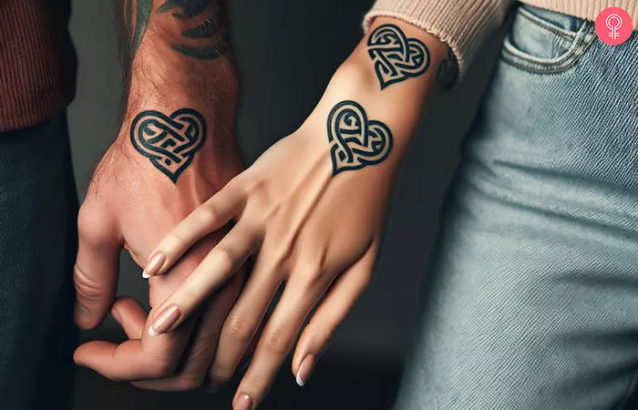 Couple with matching Celtic heart wedding tattoos
