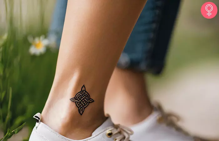 Woman with minimalist Irish tattoo on her ankle